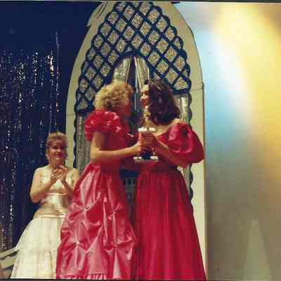 2nd runner-up Cara Martin receiving her trophy from Robin Moody.
