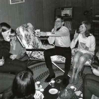 A B/W photograph of a CYO party at Sue McEnnany's house,