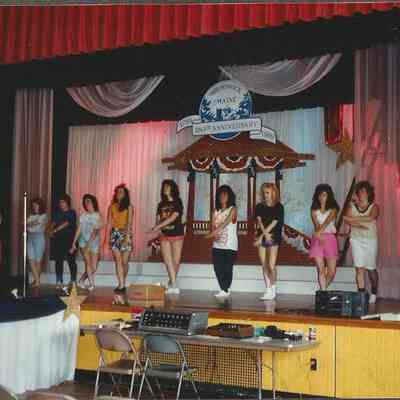 practicing the opening number.