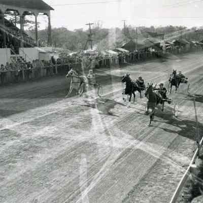 A photo of horse racing at Topsham Fair.