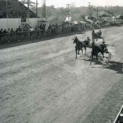 A photo of horse racing at Topsham Fair.