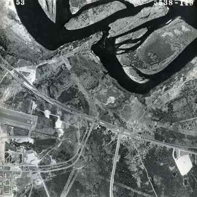 An aerial view of Cook's Corner and the Androscoggin River. 5/4/1953.