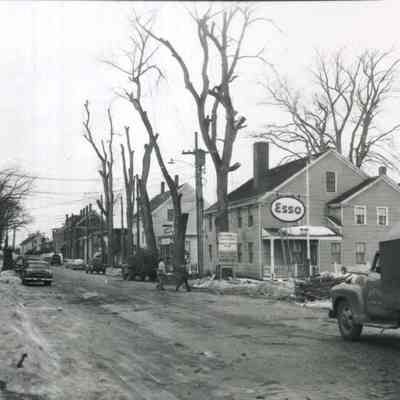 A photo of the houses on Mill Street that are to be demolished. 3/1956.