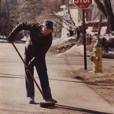A photo view of sweeping the streets. 4/19/1988.