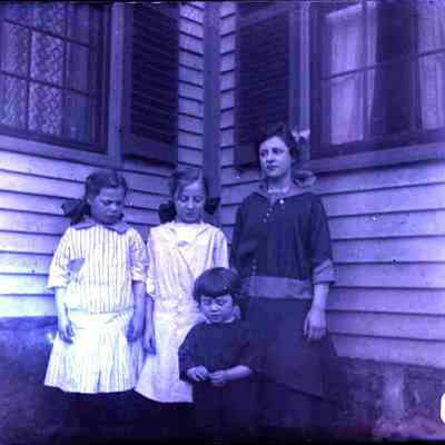 Three children and an adult.