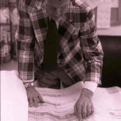 A photo view of someone looking at the plans.