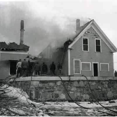 A photo of a fire on Bailey Island. 3/23/1955