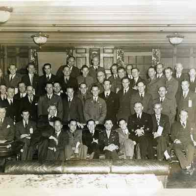 46 men in a room