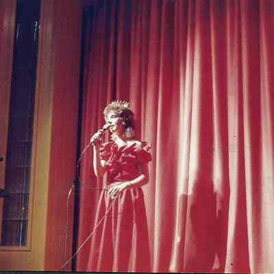 A color photograph of Phyllis Gaudreau singing.