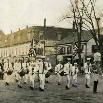 A picture postcard of Maine St. and the Old Tondreau Block.