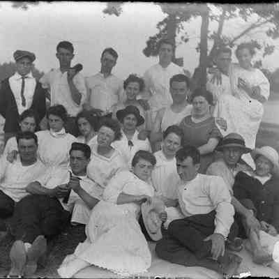 A group of people at the shore.