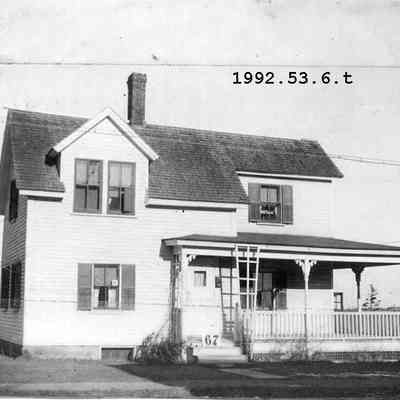 A photo of the house at 67 Jordan Ave. opposite Joan.