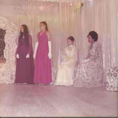 After naming the four finalists standing is Barbara Aldridge and Kathy Livernois.