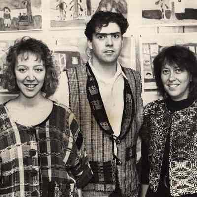 A photo view of three people at Spindleworks. 6/4/1992.