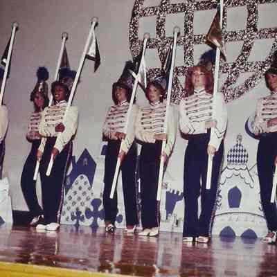 A color photograph of the group.