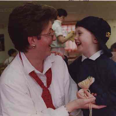 A photo view of a woman and a little boy. 5/6/1988.