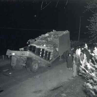 A photo of a fruit truck that hit the Mill Street underpass. 5/13/1955.