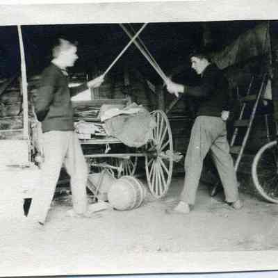 Two men fencing