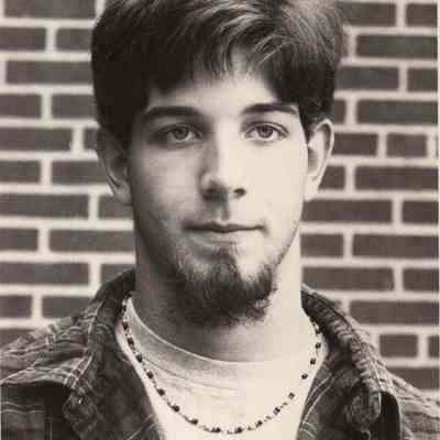 A photo view of a young man with chin whiskers. 6/5/1972.