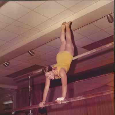 Contestant # 8 Edithe Morgan will do a routine on the parallel bars