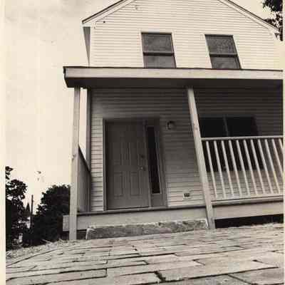 A photo view of a front door to a house. 8/18/1992.