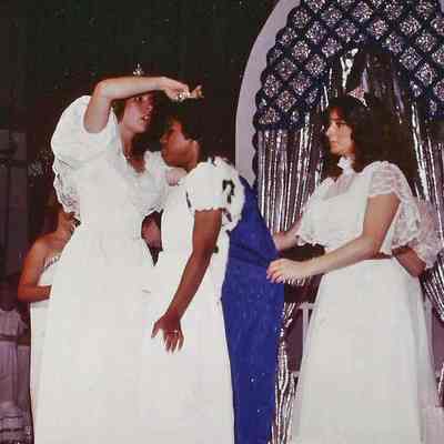 A color photograph of Kim Carslick getting ready to walk down the ramp.