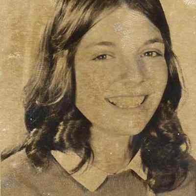 A B/W photograph of Debbie Coffin.