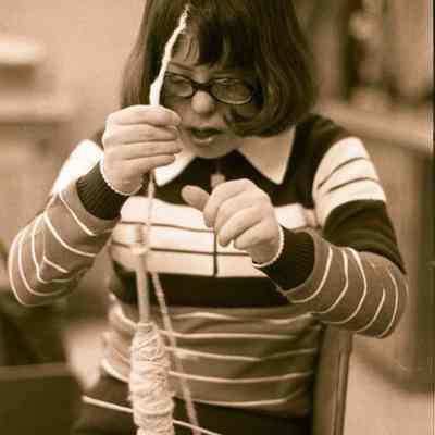A photo view of a student at BHS spinning wool.10/11/1979.