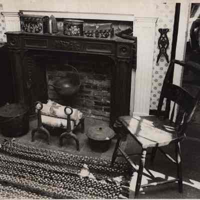 A photo view of a fire place. 1980.