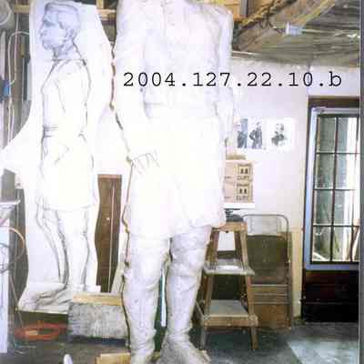 A color photograph of a full front view of the JL Chamberlain statue.