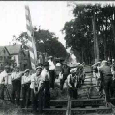 A photo of Maine St, RR & Trolley lines crossing.