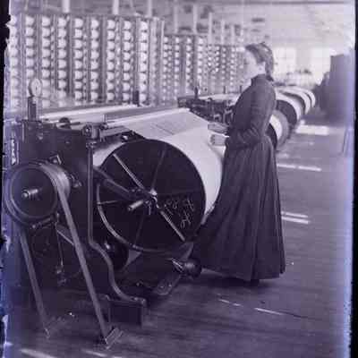 A woman working in a factory.
