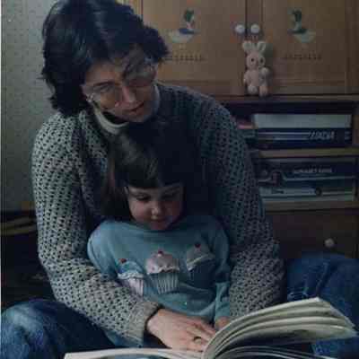 A photo view of a woman and a child. 4/3/1989.
