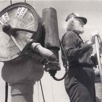A photo view of a ship captain steering the ship. 5/29/1992