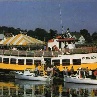 A picture postcard view of the vessel "Island Romance".