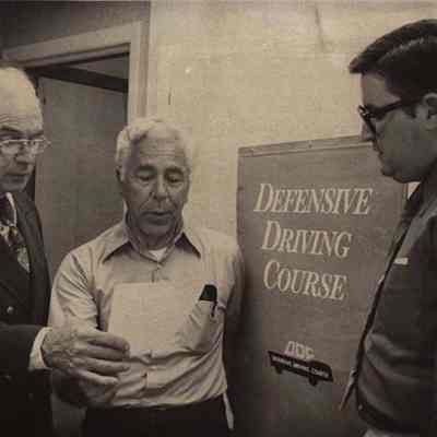 A photo view of Alfred Senter discussing driving course.