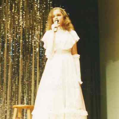 Charity Edwards singing.