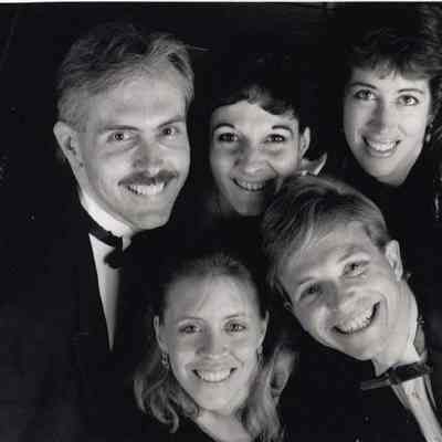 A photo view of five people.