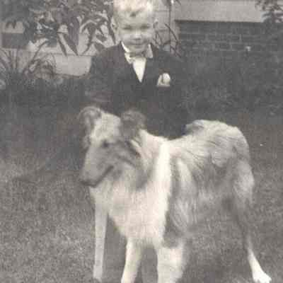 A boy with a dog.