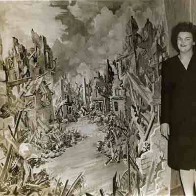 Edythe Laws with "War Destruction" Painting