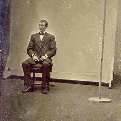 Unidentified Man Sitting for Portrait Photograph