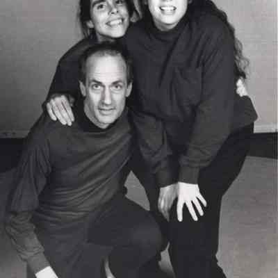 A photo view of three people.