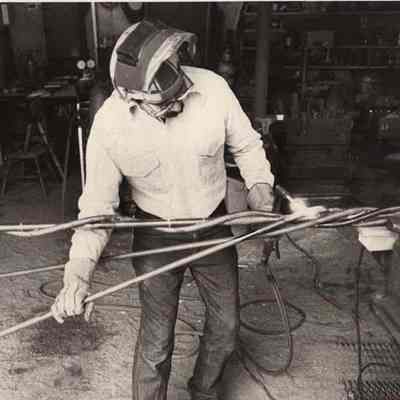 A photo view of Jim Bennis bending some rods. 2/7/1992.