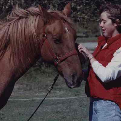 A photo view of a girl and a horse. 10/10/1989.