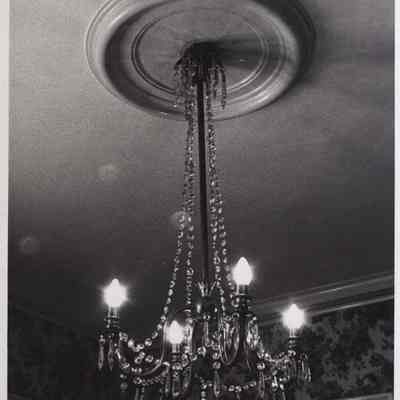 A photo view of a chandelier at PHS Museum. 1975.