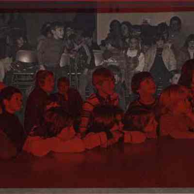 A photo view of a group of kids watching Clown Al. 1/29/1980