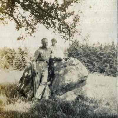 Man and Child on a Rock