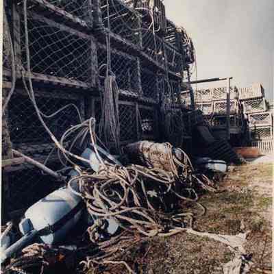 A photo view of a pile of lobster traps. 4/22/1991.