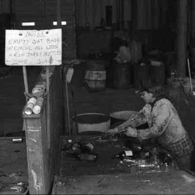 A photo view of a work women at Harpswell Recycling Center. 1/13/1989.