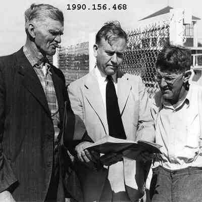 Emery Booker (center) and Two Men